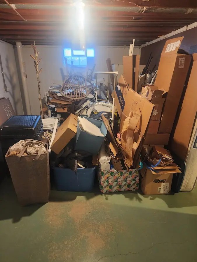 Roll-off dumpster container at job site for 2 Yard Dumpster Rental in Ford City